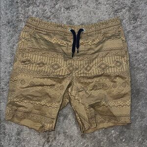 Modern Amusement Tan and Black Board Shorts with Geometric Pattern